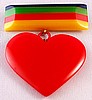 SZ57 Shultz laminated bakelite bar/red heart pin